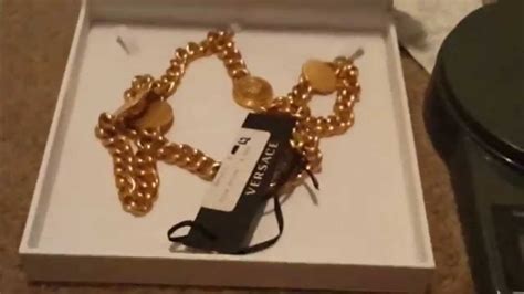 how to spot fake versace jewelry|is versace necklace real.